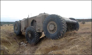 Illustration for article titled DARPA's Crusher Drives Itself, Laughs at Your Puny "Traffic"